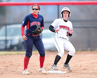 YOUNGSTOWN, OHIO - MARCH 20, 2015: Katie Smallcomb #5 of YSU stops at second base after hitting a double in the bottom of the 2nd inning during Friday evenings game at the YSU Softball Complex.(Photo by David Dermer/Youngstown Vindicator) Vanessa Garcia #9 of Detroit pictured.
