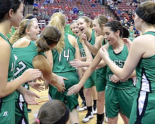 Jeff Lange | The Vindicator  West Branch's Melinda Trimmer (14) is cheered on by teammates during the pregame of the Lady Warriors' DII state semifinal game against Toledo Rogers, Friday night in Columbus. Despite West Branch's efforts, they fell to Rogers 51-37.