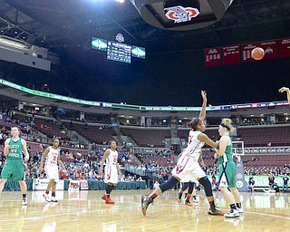 Jeff Lange | The Vindicator  West Branch's Pavin Heath (21) attempts a three point shot over a host of teammates and Toledo defenders during fourth quarter action of their DII state semifinal game, Friday night at the Schott in Columbus. The Lady Rams beat West Branch 51-37.