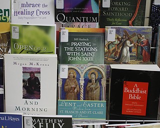        ROBERT K. YOSAY  | THE VINDICATOR..Carla Hlavac is director of Diocese of Youngstown Library and Media Center. She takes pop up library to various events. the library is not just for Catholics. It has a wide range of spiritual books,. ..