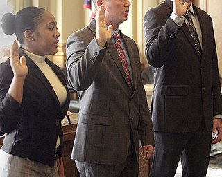        ROBERT K. YOSAY  | THE VINDICATOR.. ..Sworn in was Jeshalia Dunkle, 22, of Youngstown; Travis Sheely, 24, of Mineral Ridge; and Michael Conway, 24, of Niles.