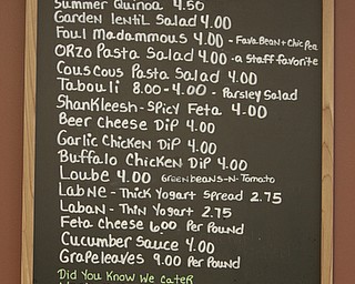        ROBERT K. YOSAY  | THE VINDICATOR..The local Mediterranean deli, bakery and caterer, GhossainÕs on the citys southside - turned 45 this year. Over the past few years, the company has expanded its catering side of the business and makes hummus for local schools...