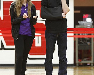        ROBERT K. YOSAY  | THE VINDICATOR..Bad move as the ROBOT makes a move to the side as April Basista and Lane Bowman from MCCTC  heads to  out of bounds .. The 18th annual Northeast Ohio Robotics Education Program Competition took place at Beeghly Center at YSU.Eighteen teams from 11 schools from Mahoning, Trumbull counties competed,..