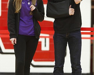        ROBERT K. YOSAY  | THE VINDICATOR..Bad move as the ROBOT makes a move to the side as April Basista and Lane Bowman from MCCTC  heads to  out of bounds .. The 18th annual Northeast Ohio Robotics Education Program Competition took place at Beeghly Center at YSU.Eighteen teams from 11 schools from Mahoning, Trumbull counties competed,..