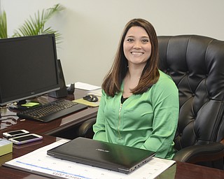 Katie Rickman | The Vindicator.C.J. Green of C.J. Green Tax Services has an office downtown Youngstown at 16 Wick Ave.  she enjoys working downtown Youngstown.