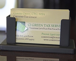 Katie Rickman | The Vindicator.C.J. Green of C.J. Green Tax Services has an office downtown Youngstown at 16 Wick Ave.  she enjoys working downtown Youngstown.