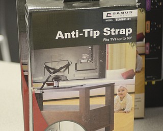 Katie Rickman | The Vindicator.Anti-tip straps are one of the many items donated for the Struthers Safety Fair.