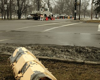        ROBERT K. YOSAY  | THE VINDICATOR..A new traffic system is being set up in Canfield as Cornerstone Electric in Salem installs the lights w traffic sensors and also sensors for emergency vehicles that will trip the lights to red, the city also gets new cross walk signs.  Adam Blackwood with Cornerstone installs a new light at Main and Broad in Canfield