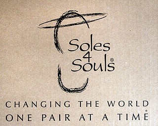        ROBERT K. YOSAY  | THE VINDICATOR..Soul 4 Souls at St Charles Church in Boardman collects shoes and distributes them to people in need of shoes..