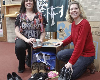        ROBERT K. YOSAY  | THE VINDICATOR..Linda has names..Soul 4 Souls at St Charles Church in Boardman collects shoes and distributes them to people in need of shoes..