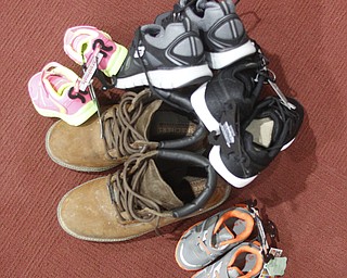        ROBERT K. YOSAY  | THE VINDICATOR..Soul 4 Souls at St Charles Church in Boardman collects shoes and distributes them to people in need of shoes..