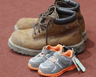        ROBERT K. YOSAY  | THE VINDICATOR..Soul 4 Souls at St Charles Church in Boardman collects shoes and distributes them to people in need of shoes..