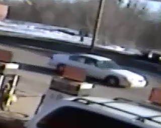 Warren police are releasing a photo of a white automobile that might have been involved in a March 12 fatal pickup truck accident on West Market Street.
