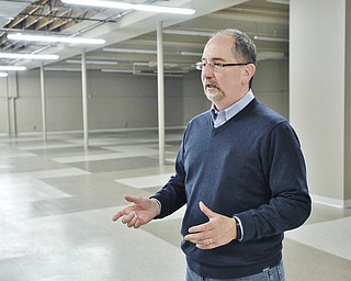 Jeff Lange | The Vindicator  Dave Nestic of TBEIC talks of the plans for the mezzanine located at their new location on Market Street in Warren, March 11, 2015.
