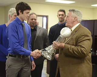 Katie Rickman | The Vindicator.John Kopp presents Colin Burdette of Hubbard the Heart of a Champion Award on March 12, 2015.