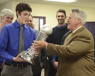 Katie Rickman | The Vindicator.John Kopp presents Colin Burdette of Hubbard the Heart of a Champion Award on March 12, 2015.