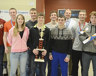 Katie Rickman | The Vindicator.Jackson-Milton High School physics students pose for a photo with their teacher, they recently won several awards at a physics competition...L-R back row.Tommy Carnes, Caleb Spalding, Tyler Totani, Ryan Moore, Steve Mohr (physics teacher), Nate Kramer, and Mack Mohan..Front Row.Kori Edwards, Jeffery Voland, and Jarrod Kegley