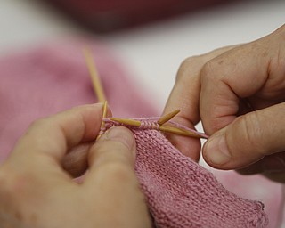       ROBERT K. YOSAY  | THE VINDICATOR..TheyÕre a closeknit group in more ways than one..The Thursday knitters at Grace United Methodist Church, Warren meet weekly, weather permitting, from 10 a.m. into mid-afternoon.a.