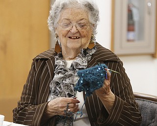        ROBERT K. YOSAY  | THE VINDICATOR..TheyÕre a closeknit group in more ways than one..The Thursday knitters at Grace United Methodist Church, Warren meet weekly, weather permitting, from 10 a.m. into mid-afternoon.a.