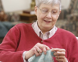        ROBERT K. YOSAY  | THE VINDICATOR..TheyÕre a closeknit group in more ways than one..The Thursday knitters at Grace United Methodist Church, Warren meet weekly, weather permitting, from 10 a.m. into mid-afternoon.a.