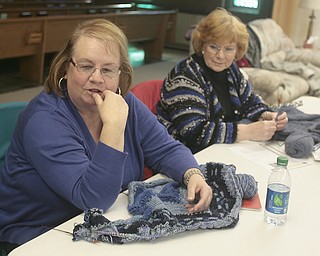        ROBERT K. YOSAY  | THE VINDICATOR..TheyÕre a closeknit group in more ways than one..The Thursday knitters at Grace United Methodist Church, Warren meet weekly, weather permitting, from 10 a.m. into mid-afternoon.a.