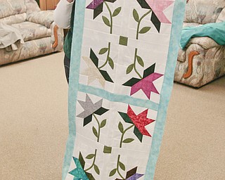        ROBERT K. YOSAY  | THE VINDICATOR..TheyÕre a closeknit group in more ways than one..The Thursday knitters at Grace United Methodist Church, Warren meet weekly, weather permitting, from 10 a.m. into mid-afternoon.a.