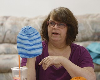        ROBERT K. YOSAY  | THE VINDICATOR..TheyÕre a closeknit group in more ways than one..The Thursday knitters at Grace United Methodist Church, Warren meet weekly, weather permitting, from 10 a.m. into mid-afternoon.a.