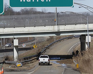        ROBERT K. YOSAY  | THE VINDICATOR..Warm Temperatures and Melting snow shut down the entrance ramp to  Warren -422 - westbound from  Rt 62 -