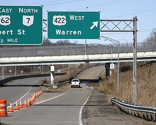        ROBERT K. YOSAY  | THE VINDICATOR..Warm Temperatures and Melting snow shut down the entrance ramp to  Warren -422 - westbound from  Rt 62 -