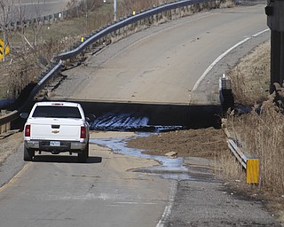        ROBERT K. YOSAY  | THE VINDICATOR..Warm Temperatures and Melting snow shut down the entrance ramp to  Warren -422 - westbound from  Rt 62 -