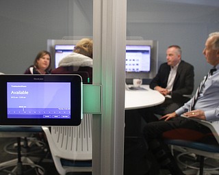        ROBERT K. YOSAY  | THE VINDICATOR..The Room WIzard scheduling - outside a portable  meeting room..Ohio Desk, on Market St in Boardman a mostly commercial desk company based in Cleveland, recently updated its showroom and it has expanded its offerings to local customers here...