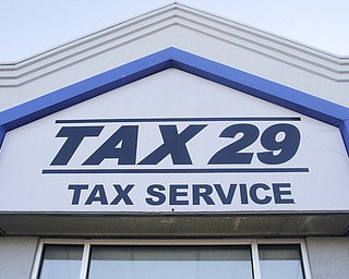        ROBERT K. YOSAY  | THE VINDICATOR..Tax 29/ Andrew Reigstad is busy as the tax season hits the home stretch- in his poland office on 224