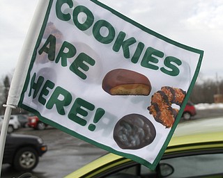        ROBERT K. YOSAY  | THE VINDICATOR...Girl Scout cookies by the thousands of boxes, arrived via 4 semi-trucks Friday  at W. D. Packard Music Hall here and are arriving sat at St. Michael Parish in Canfield to be picked up by local Girl Scout leaders for distribution to their troop members.