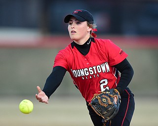 YOUNGSTOWN, OHIO - MARCH 25, 2015: Second basemen Brittney Moffatt #2 of YSU underhands the ball to 1st base for the 3rd out in the top of the 3rd inning during game 2 of a doubleheader Wednesday night at the YSU Softball Complex. (Photo by David Dermer/Youngstown Vindicator)
