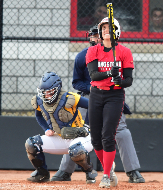YOUNGSTOWN, OHIO - MARCH 25, 2015: Batter Miranda Castiglione #17 of YSU grits her teeth after swinning and missing a pitch during an at bat in the bottom of the 5th inning during game 1 of a doubleheader Wednesday night at the YSU Softball Complex. (Photo by David Dermer/Youngstown Vindicator)