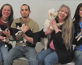 WILLIAM D. LEWIS | THE VINDICATOR: Members of the Angels for Animals Garage Sale Committee are, from left, Diane Less, founder; Keith Novotak, feline manager; Lisa Berry-Kishok, office administrator; and Lauren Potts, outreach director.