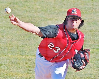 Jeff Lange | The Vindicator  Youngstown State University's starting pitcher Josh North delivers a pitch to a UIC batter in the first inning of game one of the Penguins' double header at Eastwood Field in Niles, Sunday, March 29, 2015.