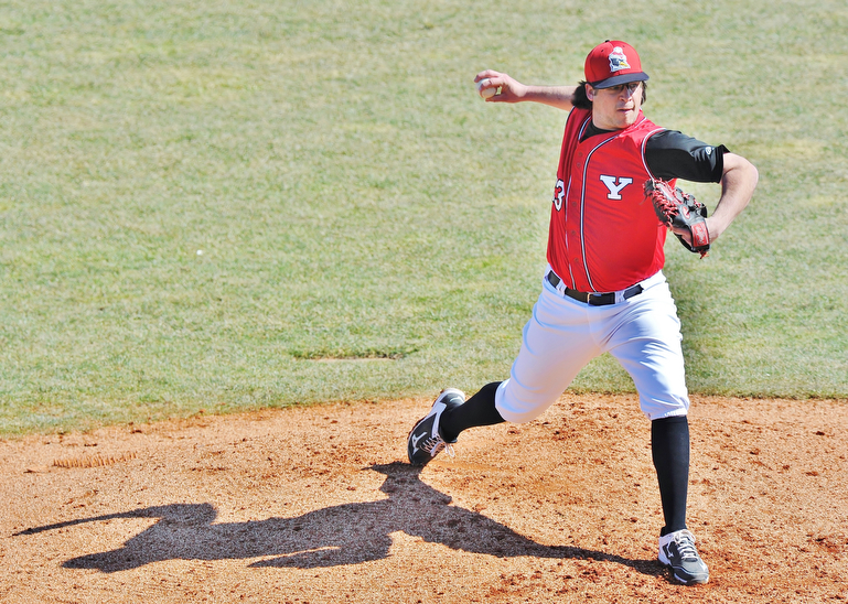 Jeff Lange | The Vindicator  Youngstown State University's starting pitcher Josh North delivers a pitch to a UIC batter early in the first game of the Penguins' double header at Eastwood Field in Niles, Sunday, March 29, 2015.
