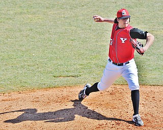 Jeff Lange | The Vindicator  Youngstown State University's starting pitcher Josh North delivers a pitch to a UIC batter early in the first game of the Penguins' double header at Eastwood Field in Niles, Sunday, March 29, 2015.