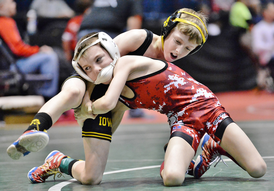 Jeff Lange | The Vindicator  Beaver Local's Jaymin Salsberry (red) works to take down Vinnie D'Alessandro of Mayfield during their 60.3 lb match for seventh place during the OAC Grade School State Wrestling Tournament held at the Covelli Centre, Sunday, March 29, 2015.