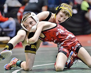 Jeff Lange | The Vindicator  Beaver Local's Jaymin Salsberry (red) works to take down Vinnie D'Alessandro of Mayfield during their 60.3 lb match for seventh place during the OAC Grade School State Wrestling Tournament held at the Covelli Centre, Sunday, March 29, 2015.