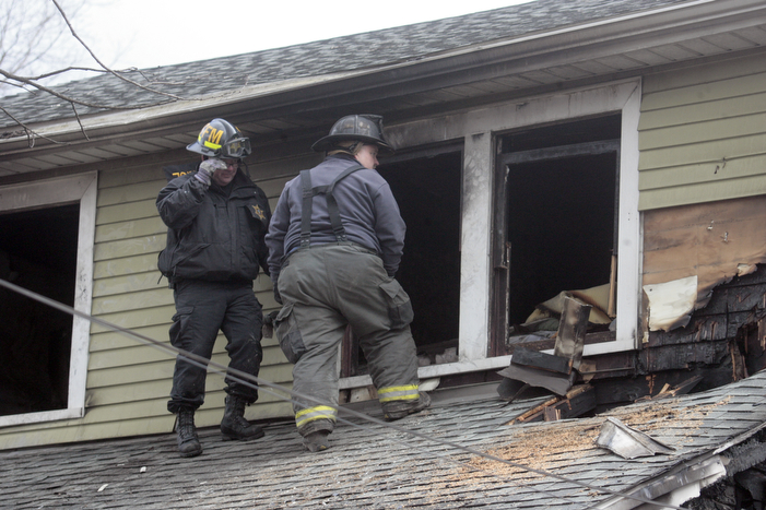        ROBERT K. YOSAY  | THE VINDICATOR..YFD, Mahoning Valley Arson Task Force, YPD detectives and State Fire Marshalls office as they investigated a fatal fire that killed Two grandparents and their 11 year old grandaughter.