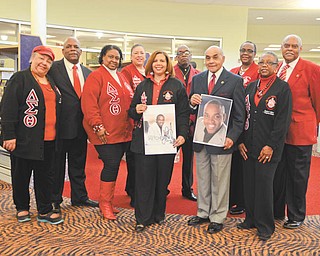 Katie Rickman | The Vindicator.Lawrence Brownlee Concert committe members pose for a photo at Newport Library on March 18, 2015...L-R from row.Chrystal Davis, Susan Moorer, Willard Boyd, and Eugenia Atkinson..Back row L-R.Nikki Davis, Harold Adams, Germaine Bennett, Dr. Ben McGee, Marcia Haire-Ellis, and Jerome Parm