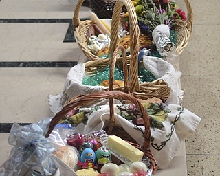 Katie Rickman | The Vindicator.Twenty-eight Easter baskets line the altar during the Easter Basket Blessing Ceremony at St. Patricks Church in Hubbard on April 4, 2015.