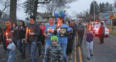 William D Lewis The vindicator Vigil for 3 people killed in Powersway housefire.