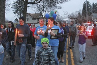 William D Lewis The vindicator Vigil for 3 people killed in Powersway housefire.