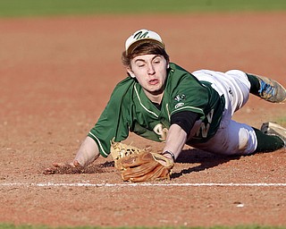 ask reporter or Bob Yosay for the player's name..04-10-15 BASEBALL Girard Indians vs Ursuline Irish at Cene Park in Struthers, OH..5th inning, Urduline's #22  makes a diving stop of a hard hit ball.