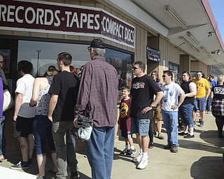 Katie Rickman | The Vindicator .A line forms outside of The Record Connection in the Pine Tree Place Shopping Center in Niles hours before the Foo Fighters Concert.  The Foo Fighters performed in honor of National Record Store Day.