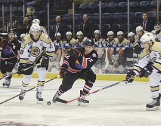 Katie Rickman | The Vindicator.Lumberjack's Joseph Cecconi (#3) blocks Phantom's Chase Pearson's (#22) pass during the first period of the game at the Covelli Centre on April 18, 2015.