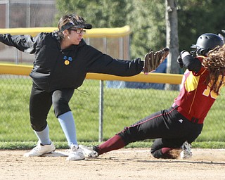 William d Lewis The Vindicator  East 3rd baseman Karesha Brown(15) tries to tag Mooney'sBella Stanko(10) during 4-21 action at Field of Dreams.